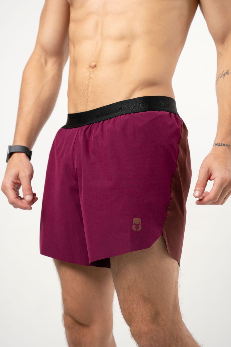 Pantaloneta Running Pro Retro Berenjena