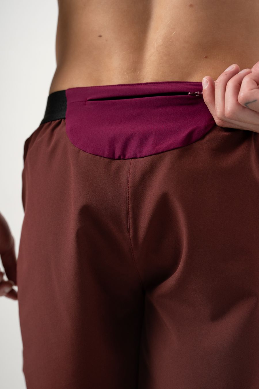 Pantaloneta Running Pro Retro Berenjena