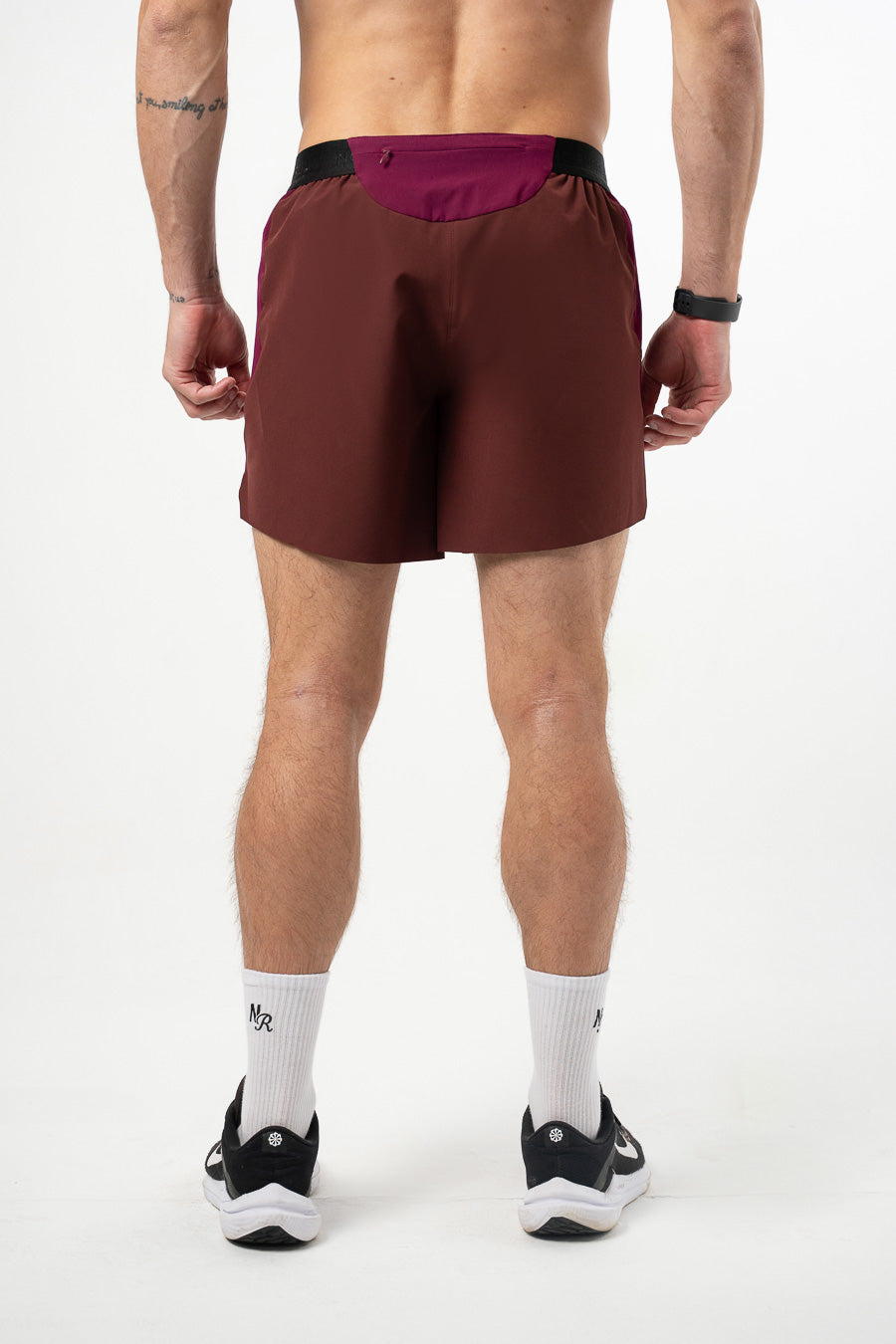 Pantaloneta Running Pro Retro Berenjena