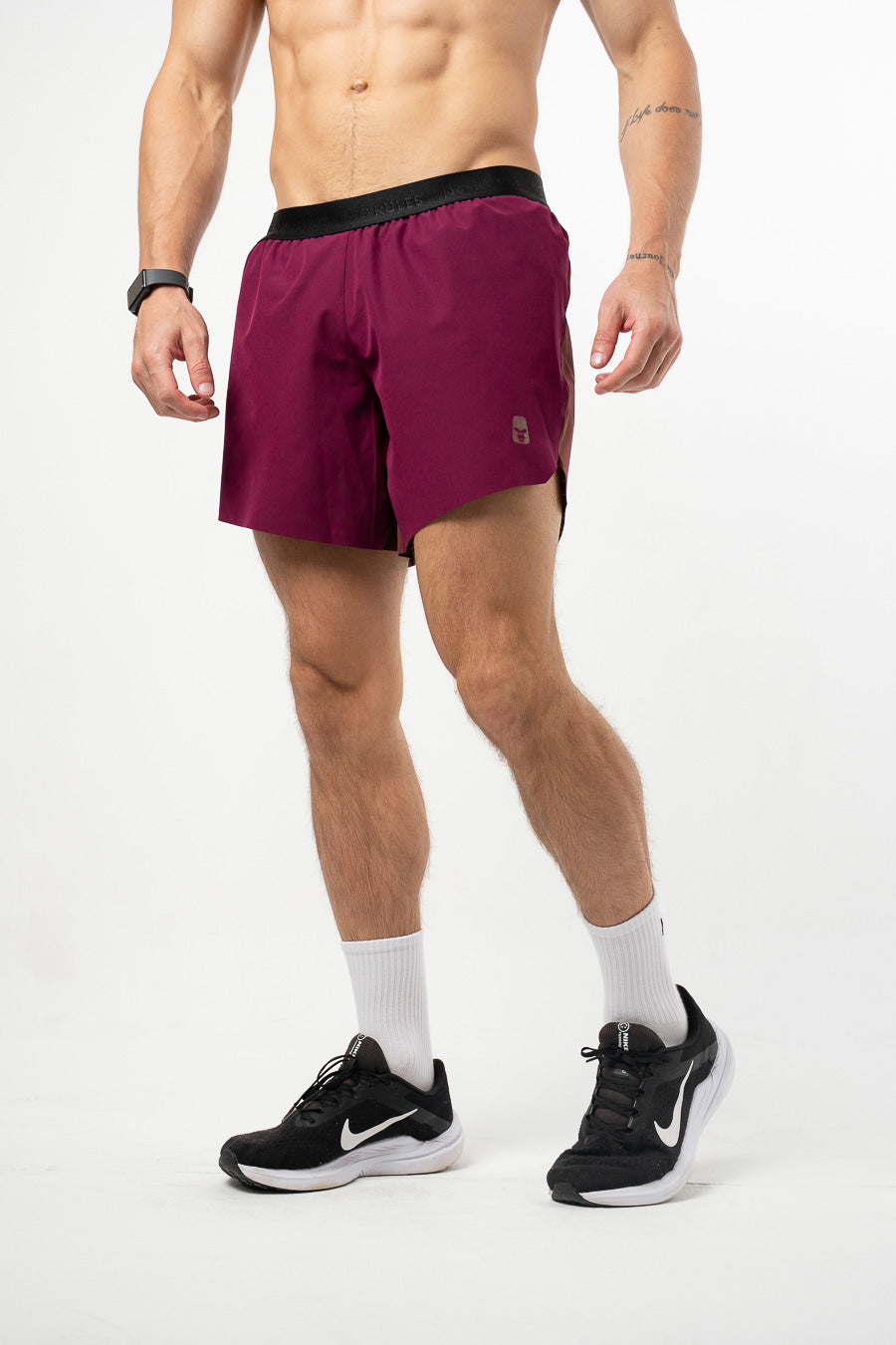 Pantaloneta Running Pro Retro Berenjena