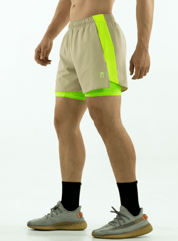 PANTALONETA RUNNING BEIGE-VERDE NEON